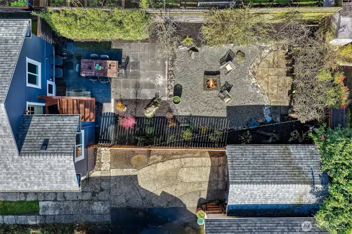 Well-maintained and nicely manicured fully-fenced backyard.