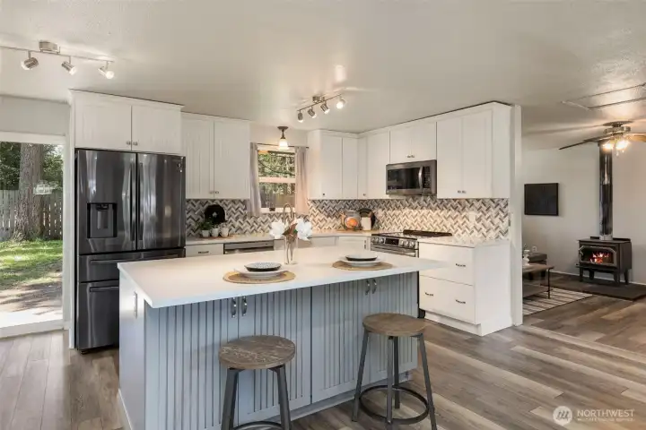 The remodeled Kitchen with quartz countertops.