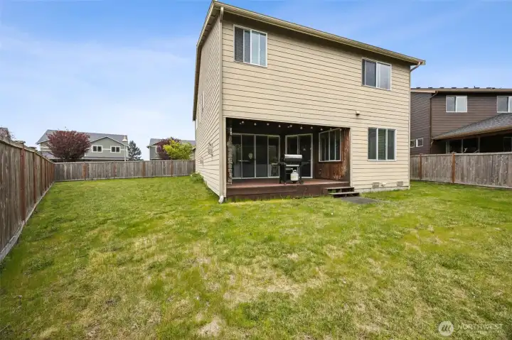 Large fully fenced backyard w/ greenbelt.