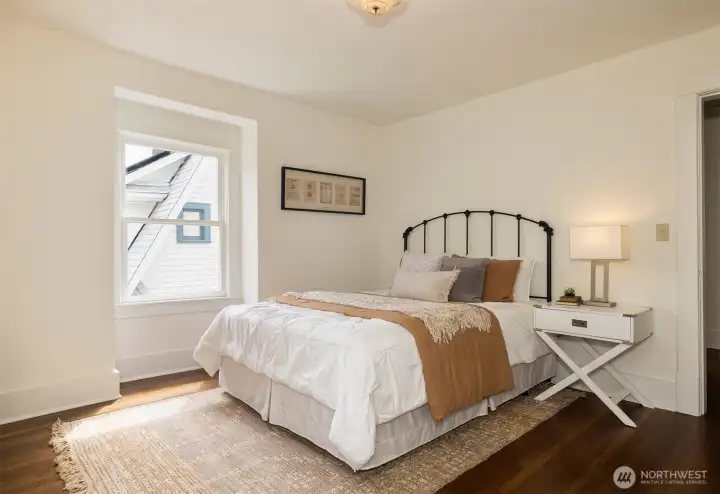 The 3rd bedroom with attached sunroom facing east
