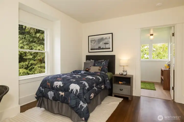 The 4th  bedroom with its own attached sunroom