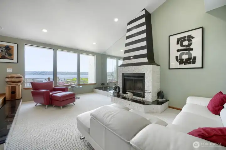 Updated fireplace surround and tile flooring.
