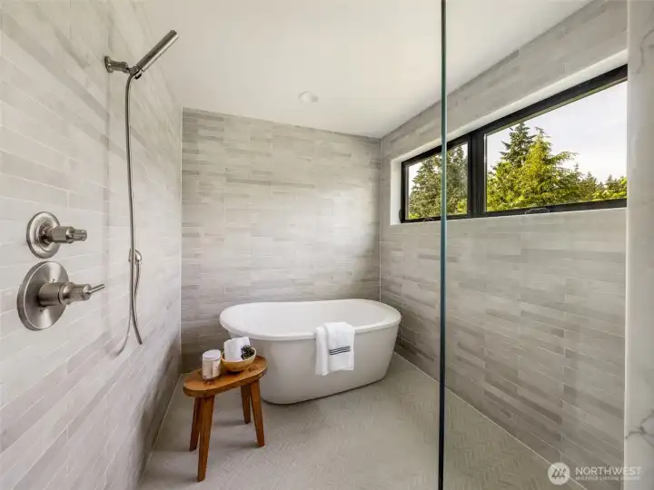 Tub has been swapped out for a larger model & new floor tile