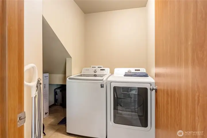Laundry room, with storage.