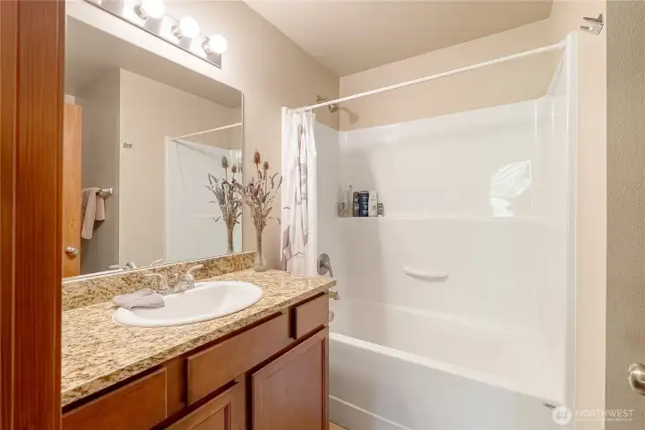 Full guest bathroom upstairs.