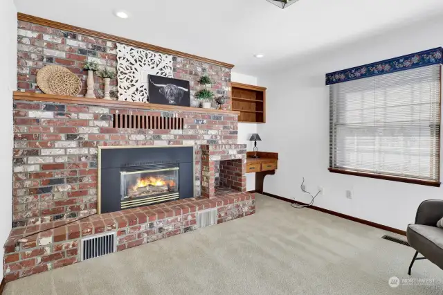 Hard to beat the warmth from a gas fireplace and the beautiful brick surround!