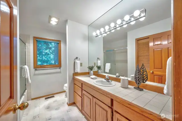 Full Bathroom upstairs with shower tub, linen closet & long countertop!
