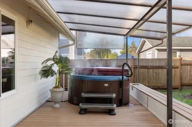 Covered hot tub to enjoy year round.