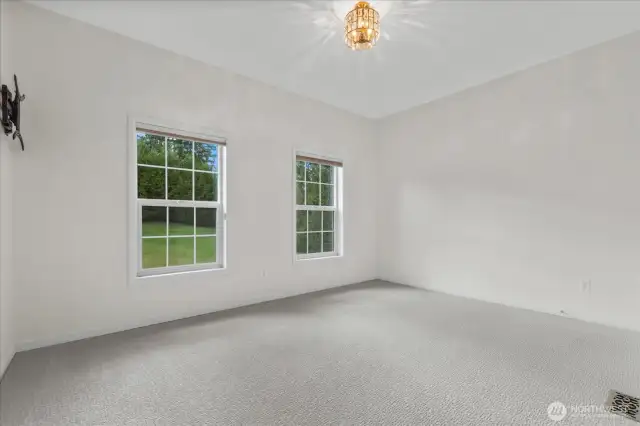 Upstairs bedroom with its own walk-in closet and bathroom.