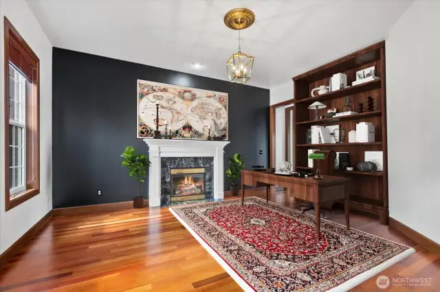 Virtually Staged. Striking formal living room or an office/library.