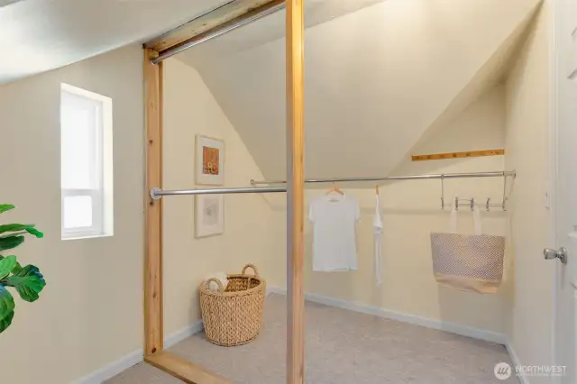 Walk in closet serves both upper bedrooms