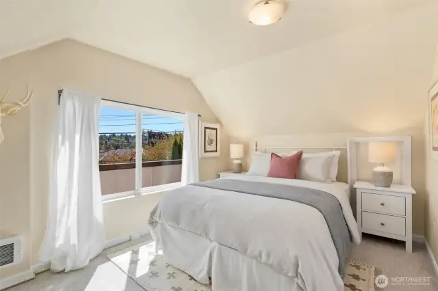 The owners used this as their primary bedroom. There is an additional porch - currently accessed thru the window. Please don't :)