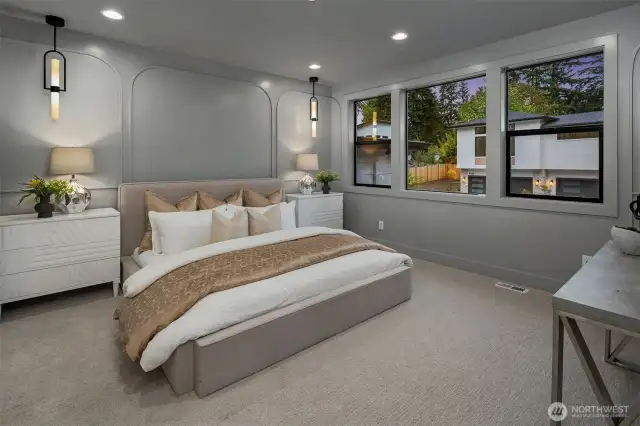 Designer primary suite with five-piece bath & heated floors
