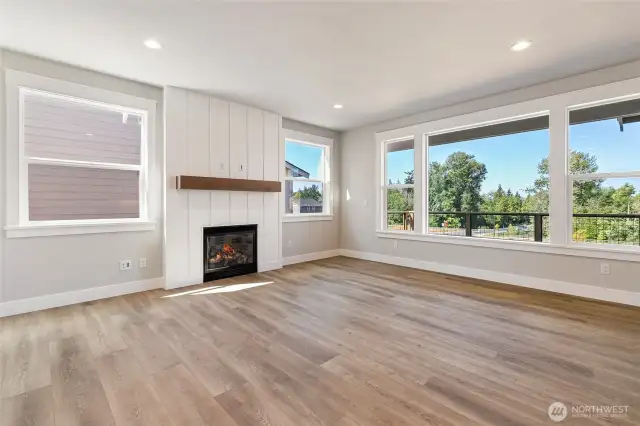 Cozy Living room with fireplace and huge window