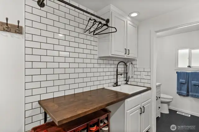 You'll find a dedicated laundry sink and plenty of extra storage.