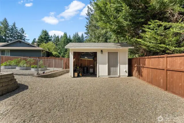 Large shed to secure your lawn and garden tools.