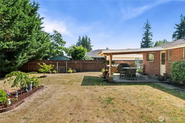 View of the fence and covered patio