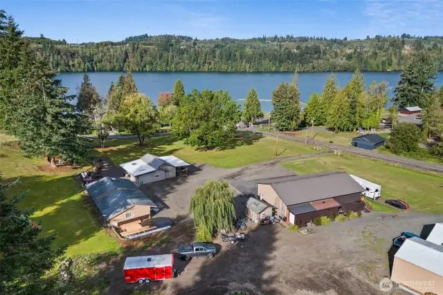 Three acres on Lake Mayfield with two homes, a one bedroom apt. full RV hook up, huge shop with gathering area. Outdoor gathering area and more! Must see!