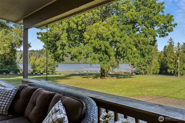 Porch view, just a short walk to the swimming hole. Bring the kayaks and the boat! The whole tribe has room for year round fun!