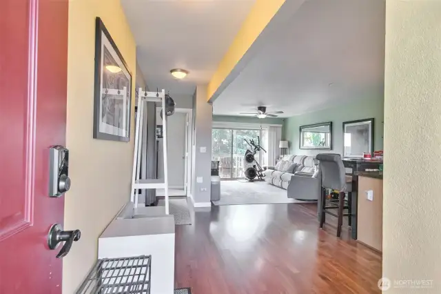 One Level Condo entering living open living room, kitchen, and dining