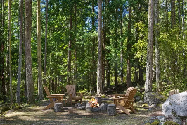 Fire pit area with lighting and seating
