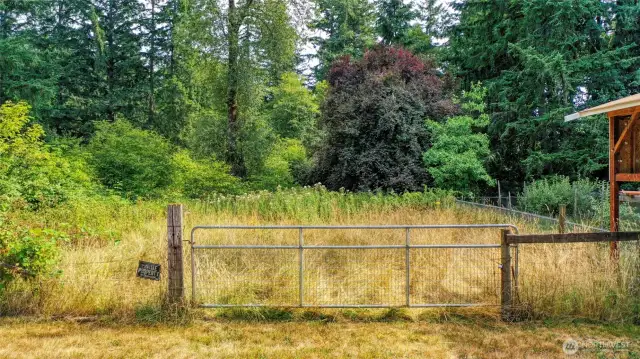 Gated access at NW corner of property.