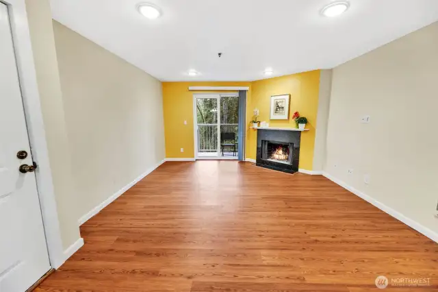 Here is another photo (same view as the  previous virtually staged view). Brand new flooring!