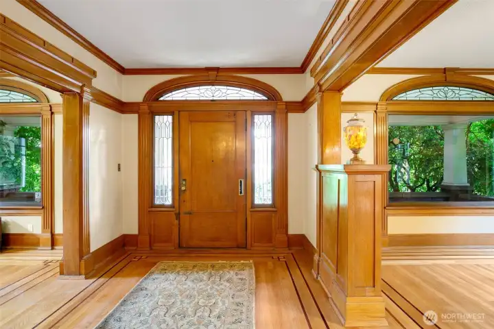 Main floor features a circular floorplan; to the right in this photo is the formal living room, to the left the parlor.