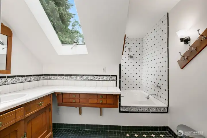Top floor bath, with skylights and very cool tub/shower.