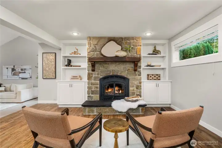Cosy den/sitting area in front of the wood fireplace