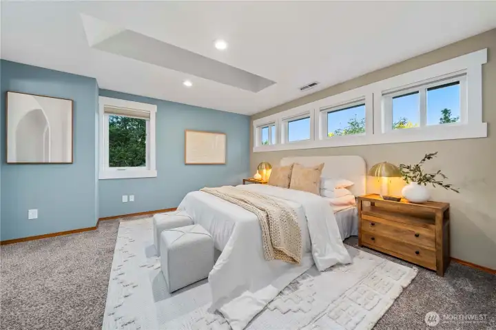 The primary bedroom offers room for a King-sized bed