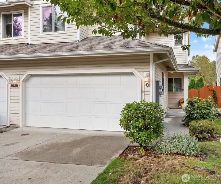 Beautiful townhome with 2 car garage. New Paint and new carpet