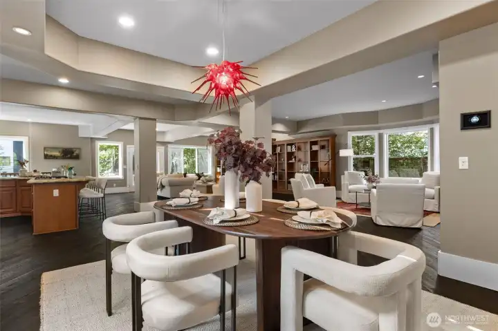 The open-concept layout flows effortlessly from the statement-making foyer to the versatile living and dining spaces.