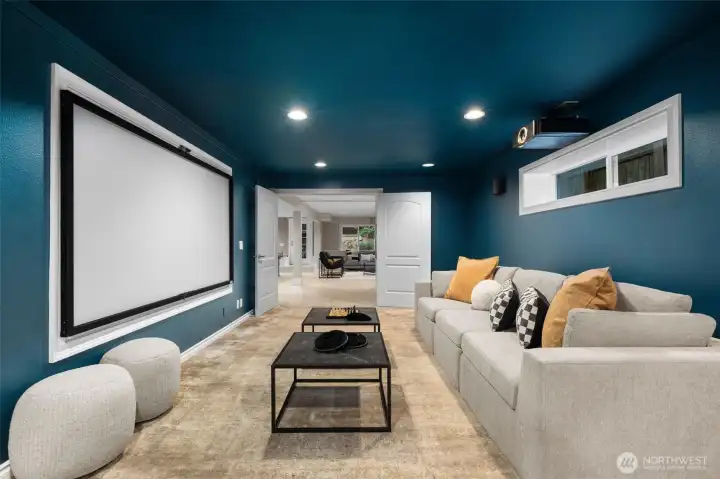 a fully equipped media room invites cozy movie nights, game-day viewings, or immersive entertainment experiences.