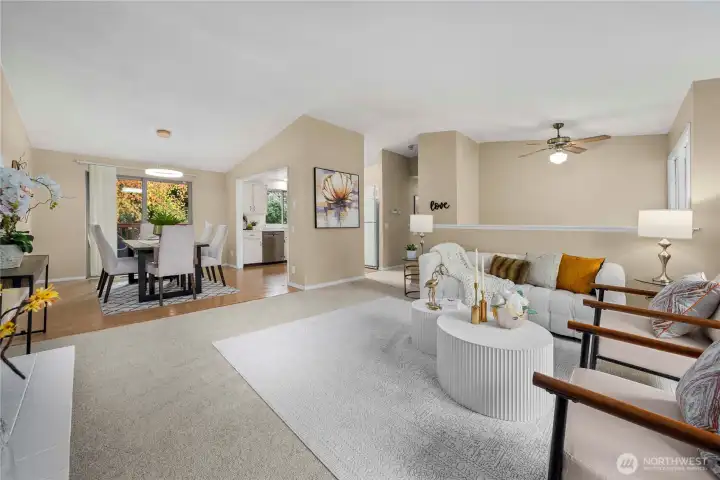 Open floor plan seamlessly connects the living room to the spacious kitchen & dining area.