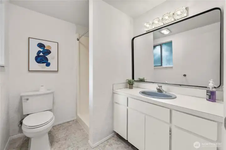 Bathroom at lower level with a shower