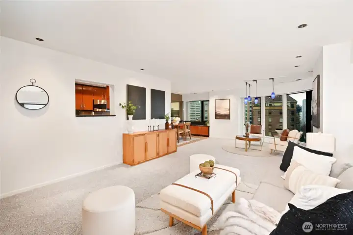 Window from kitchen opens up to living area