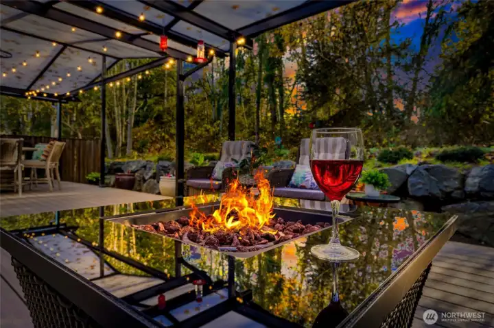 Enjoy year-round outdoor living on the spacious back deck featuring low-maintenance composite decking and a translucent covered roof that filters natural light while keeping the elements out. The deck overlooks 16 acres of Greenbelt, offering peaceful privacy, greenery, and wildlife views with no neighbors behind you.