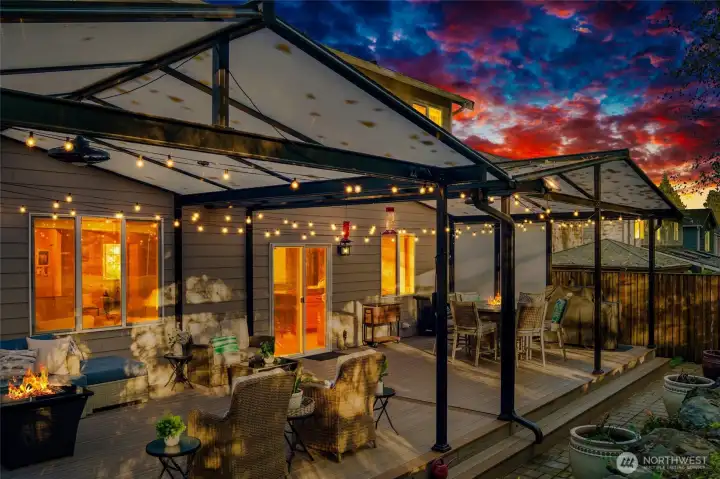 Enjoy year-round outdoor living on the spacious back deck featuring low-maintenance composite decking and a translucent covered roof that filters natural light while keeping the elements out. The deck overlooks 16 acres of Greenbelt, offering peaceful privacy, greenery, and wildlife views with no neighbors behind you.