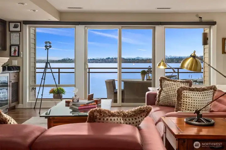 Light-filled living room framed by floor-to-ceiling views, creating a seamless indoor-outdoor connection to the surrounding beauty