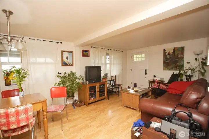 Lower-level legal apartment with lots of windows for natural light.