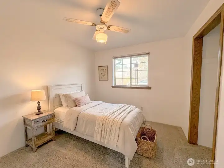 1st Bedroom is on the front side of the home. Virtually staged.