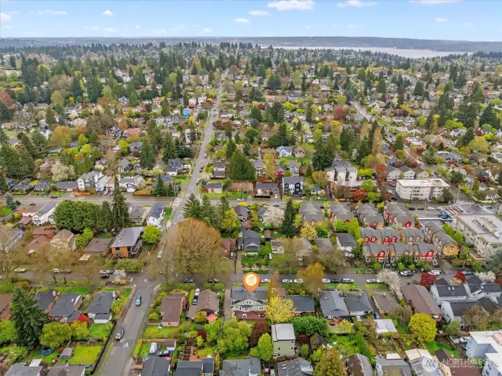 Aerial photo looking east. You can see Lake Washington from this photo. Coveted Ravenna neighborhood short distance to Children's Hospital, UW, Amazon, downtown and 520. And located in the #1 sought after school cluster!