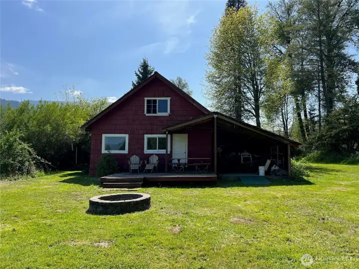 Back of the house with deck