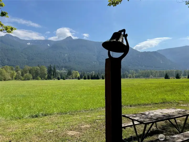 Dinner bell at the riverside picnic table