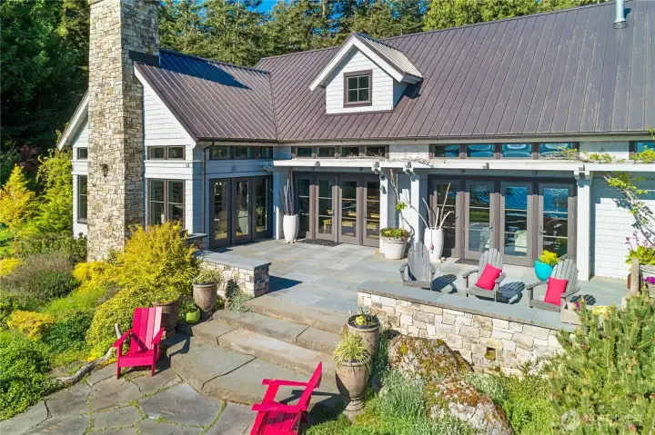 Spacious, well-designed patios embrace the best of San Juan Island living, from glowing mornings to sun-drenched afternoons - ideal for relaxed comfort and effortless entertaining.