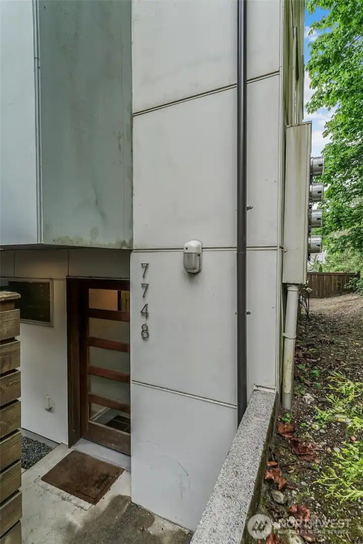 Sweet end-unit home features additional windows, natural light, privacy and a quiet setting