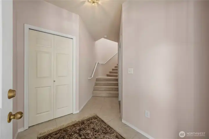 Entry on bottom level with coat closet