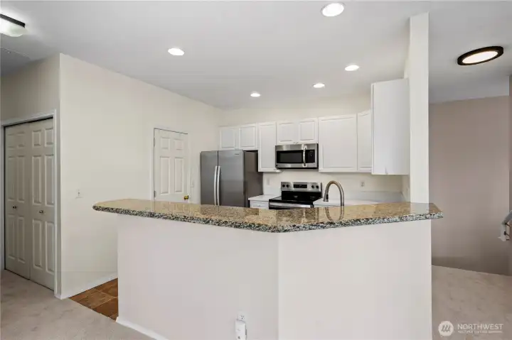 Walk in pantry as well as a high bar for additional seating