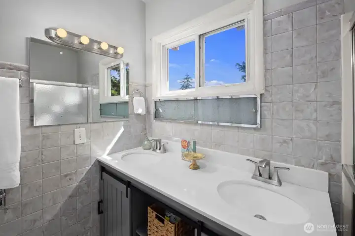 Upstairs bathroom includes shower and tub